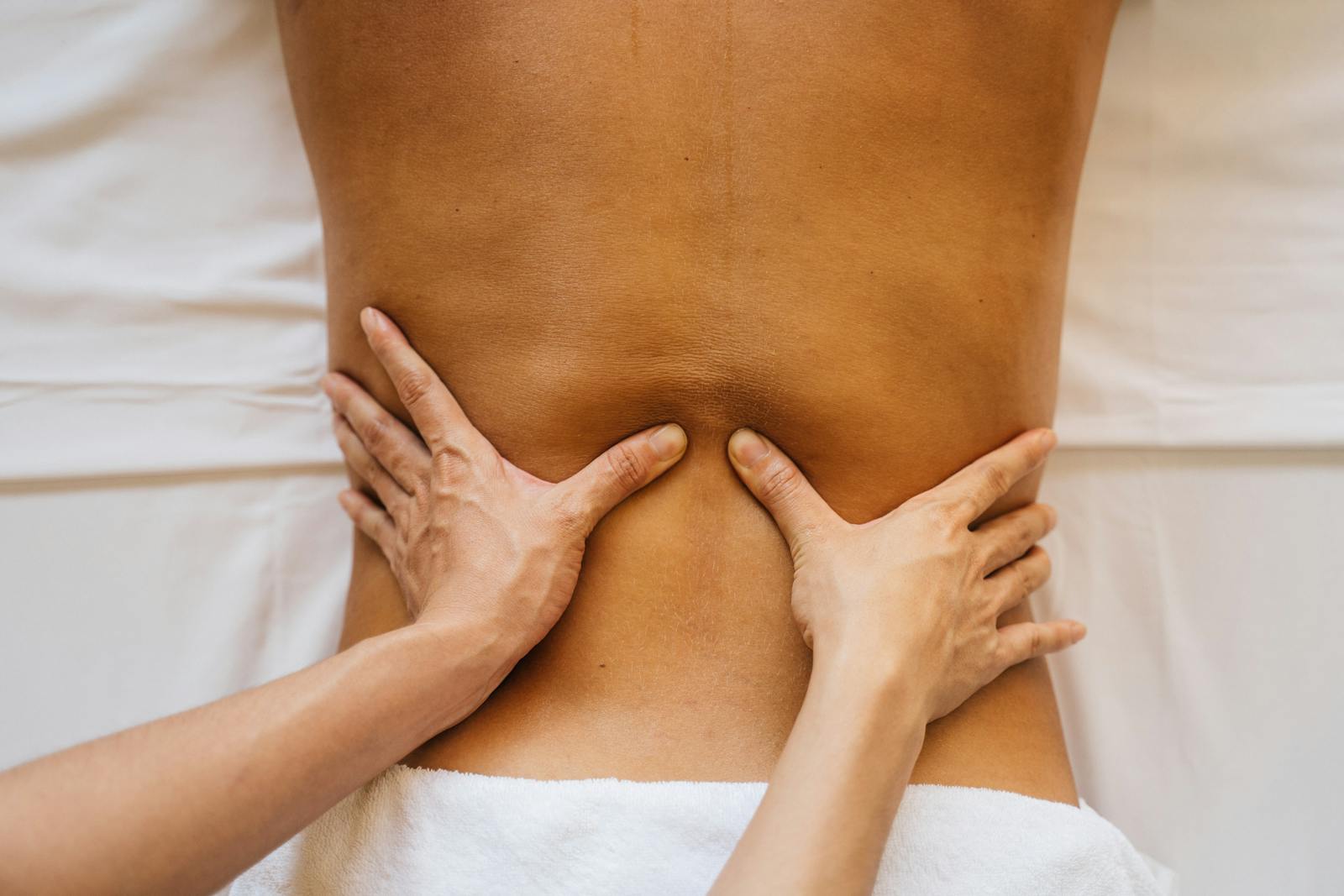 Osteopathic massage — focused touch, warm towels